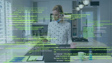 Animation-of-data-processing-over-caucasian-woman-using-laptop-and-smartphone