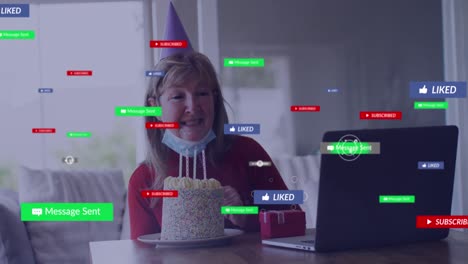Animation-of-social-media-icons-with-texts-over-senior-caucasian-woman-having-birthday-video-call