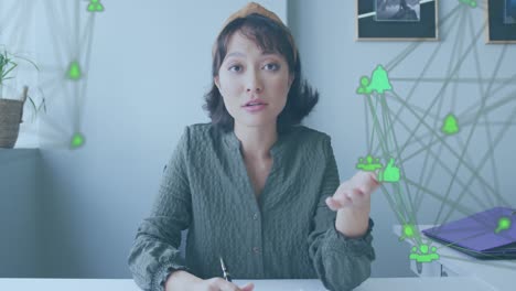 Animation-of-globe-with-network-of-connections-over-asian-businesswoman-in-office