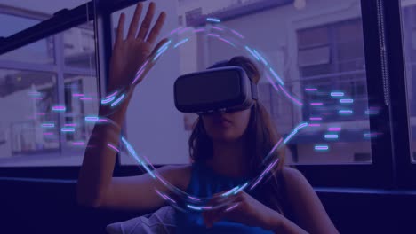 Animation-of-glowing-light-trails-of-data-transfer-over-biracial-woman-in-vr-headset