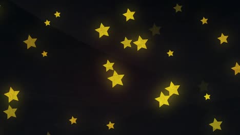 Animation-of-yellow-stars-falling-over-black-background