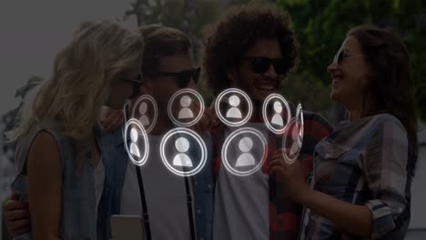 Animation-of-rotating-profile-icon-in-circles-over-diverse-friends-talking-selfie