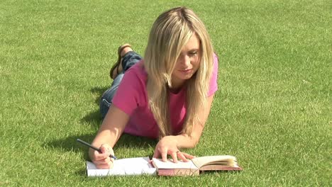 Girl-Studying-Outdoors