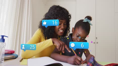 Animation-of-social-media-icons-over-african-american-mother-and-daughter-doing-homework