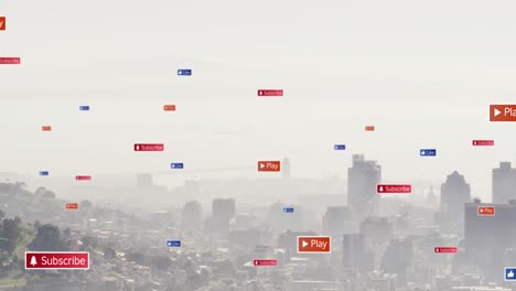 Animation-of-multiple-social-media-icons-floating-against-aerial-view-of-cityscape