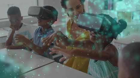 Animation-of-particles-of-light-over-diverse-female-teacher-and-pupils-in-vr-headsets-in-classroom