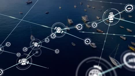 Animation-of-connected-icons-over-aerial-view-of-boats-in-ocean