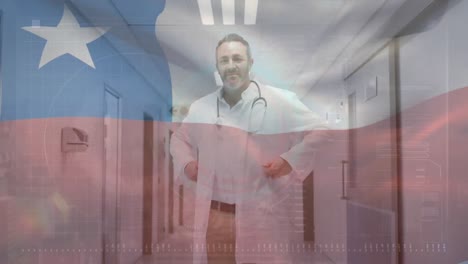 Animation-of-waving-texas-flag-against-biracial-male-senior-doctor-smiling-at-hospital