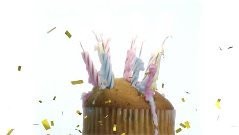 Animation-of-gold-confetti-falling-over-cupcake-with-candles