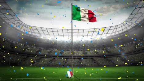 Animation-Von-Konfettig,-Das-über-Die-Italienische-Flagge-Und-Das-Sportstadion-Fällt