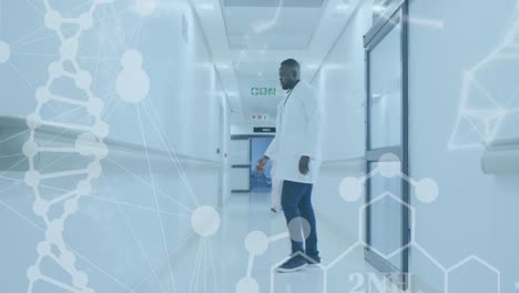 Animation-Des-DNA-Strangs-Und-Der-Medizinischen-Datenverarbeitung-über-Einem-Afroamerikanischen-Männlichen-Arzt