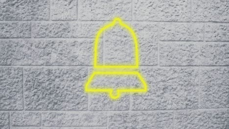 Animation-of-black-bell-icon-over-grey-wall