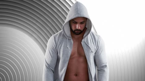 Animation-of-fit-caucasian-man-in-white-hooded-top-over-white-circles