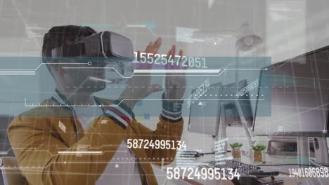 Animation-of-data-processing-over-asian-businessman-wearing-vr-headset-in-office