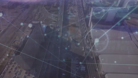 Animation-of-network-of-connections-against-aerial-view-of-cityscape