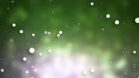 Animation-of-spots-floating-over-glowing-green-background