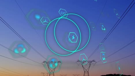 Animation-of-scope-circles-moving-with-eco-icons-over-electric-pylons-background