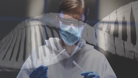 Animation-of-dna-strand-over-caucasian-male-doctor-in-ppe-suit-preparing-covid-swab-test