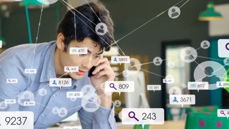 Animation-if-icons,-numbers-in-message-boxes,-connected-icons,-asian-man-talking-on-cellphone