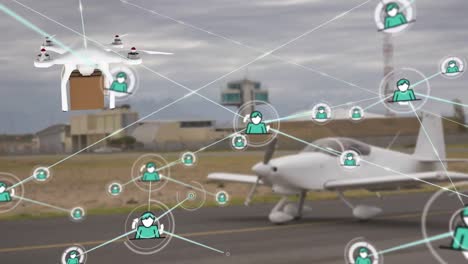 Animation-of-connected-icons-over-drone-carrying-cardboard-box-against-airplane-in-background