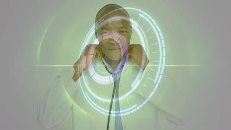 Animation-of-loading-circles,-circular-pattern,-african-american-doctor-using-stethoscope-on-screen