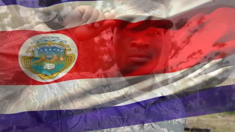 Animation-of-flag-of-costa-rica-over-african-american-male-soldier