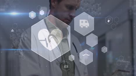 Animation-of-icons-and-medical-data-processing-over-caucasian-male-doctor