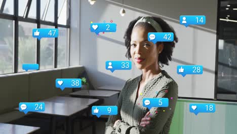 Animation-of-social-media-data-processing-over-biracial-businesswoman-in-office
