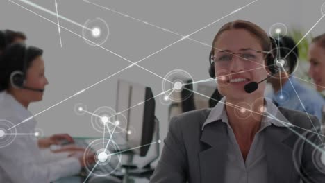 Animation-of-network-of-connections-over-diverse-business-people-with-phone-headsets