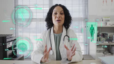 Animation-of-science-icons-and-data-processing-over-biracial-female-doctor-having-video-call