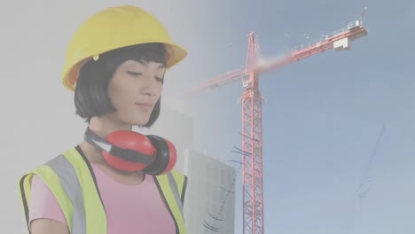 Animation-of-asian-female-architect-with-plans-over-crane
