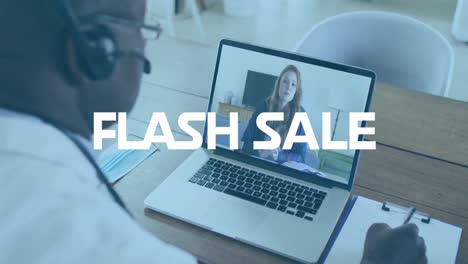 Animation-of-flash-sale-text-over-african-american-senior-male-doctor-having-a-videocall-on-laptop