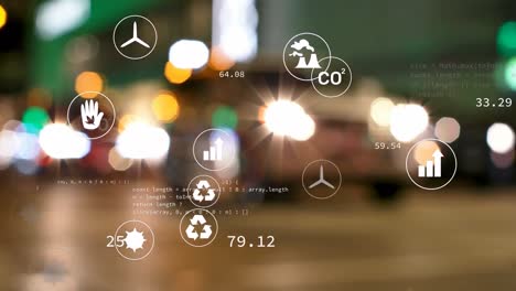 Animation-of-multiple-digital-icons-against-blurred-view-of-night-city-traffic