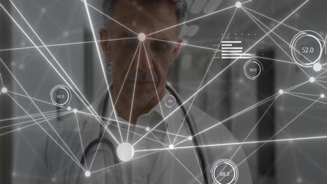 Animation-of-data-and-network-of-connections-over-caucasian-male-doctor-using-tablet