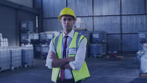 Animation-of-data-processing-on-screens-over-biracial-man-working-in-warehouse