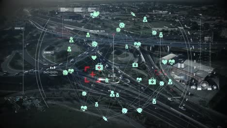 Animation-of-connected-icons-forming-globe-in-circle-over-aerial-view-of-vehicles-on-street-in-city