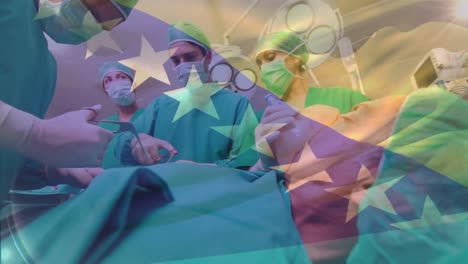 Animation-of-flag-of-bosnia-and-herzegovina-over-diverse-surgeons-performing-surgery-on-patient