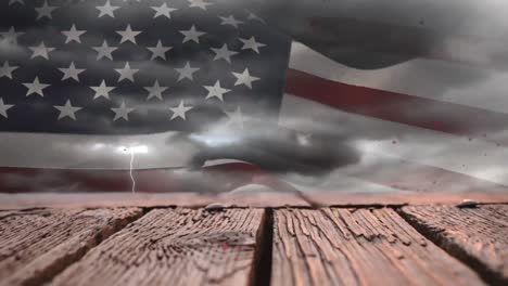 Animation-of-heart-shapes-falling-over-wooden-planks-against-flag-of-america-on-cloudy-sky