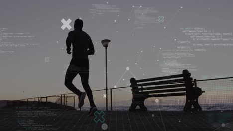 Animation-of-connected-dots-and-computer-language-over-african-american-man-running-at-beach