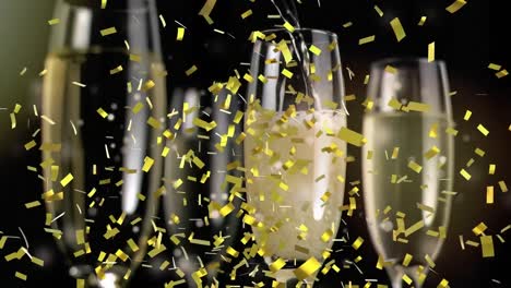 Animation-of-champagne-pouring-in-glasses-and-confetti-falling-over-black-background
