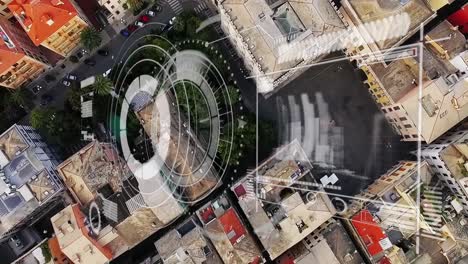 Animation-of-loading-circles,-graphs-and-arrow-over-aerial-view-of-modern-city
