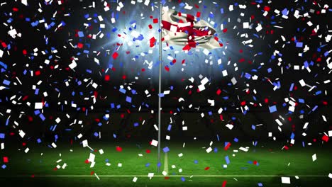 Animation-of-falling-confetti,-waving-flag-of-england-against-flash-lights-in-empty-stadium