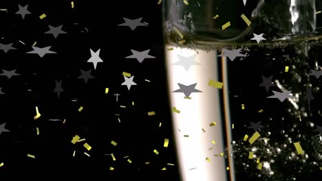 Animation-of-champagne-pouring-in-glasses-and-confetti-falling-on-black-background