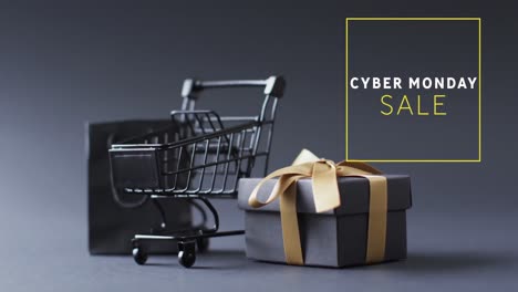 Animation-of-cyber-monday-sale-text-over-shopping-trolley-and-gifts