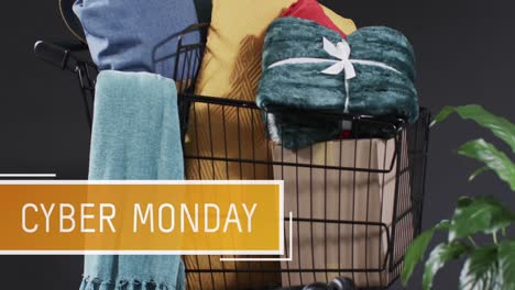 Animation-of-cyber-monday-text-over-gifts-in-trolley