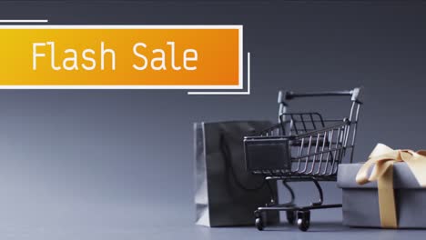 Animation-of-flash-sale-text-over-shopping-trolley