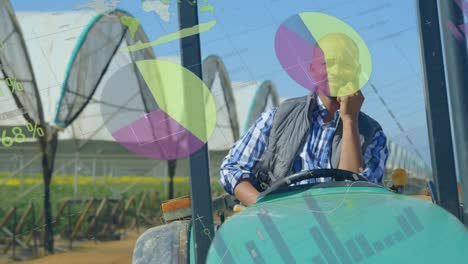 Animation-of-data-processing-over-african-american-farmer-talking-on-smartphone-sitting-on-a-tractor