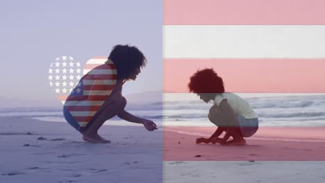 Animation-of-american-flag-and-heart-shape-over-african-american-mother-and-child-playing-at-beach