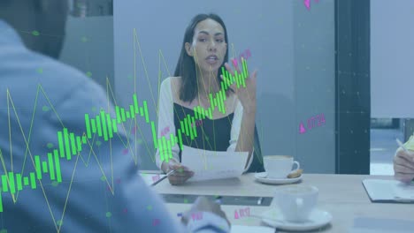 Animation-of-data-processing-over-biracial-woman-with-document-talking-to-her-colleagues-at-office