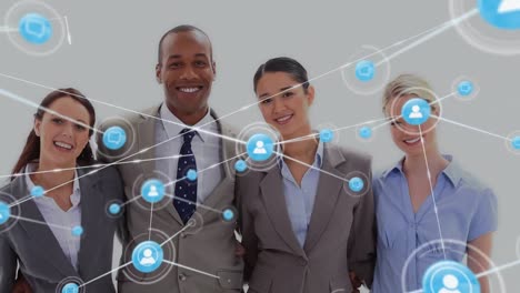 Animation-of-network-of-digital-icons-against-portrait-of-diverse-businesspeople-smiling-together